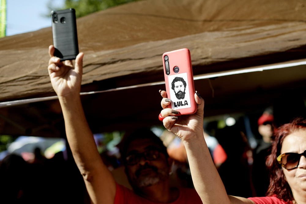Supporters of Brazil's former president and current presidential candidate Luiz Inácio Lula da Silva using a cellphone at an event in Rio de Janeiro this week.
