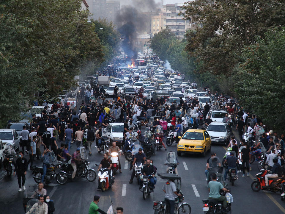 A picture obtained by AFP outside Iran on Sept. 21 shows Iranian demonstrators in Tehran during a protest for Mahsa Amini, days after she died in police custody.