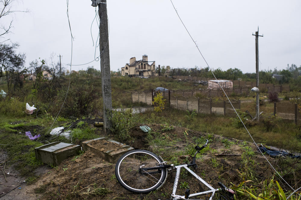 Detritus litters a former Russian position in Borshchova on Friday.