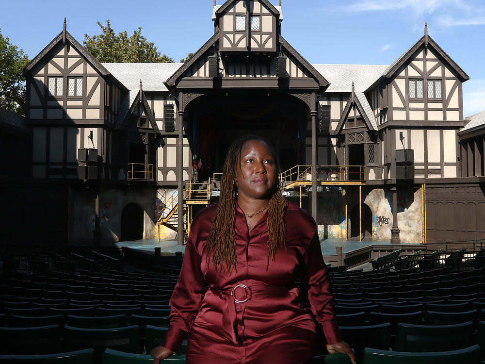 Oregon Shakespeare Festival Artistic Director Nataki Garrett stands inside the Allen Elizabethan Theatre in Ashland, Ore. She recently programmed her first full season but not everyone has embraced her new approach.