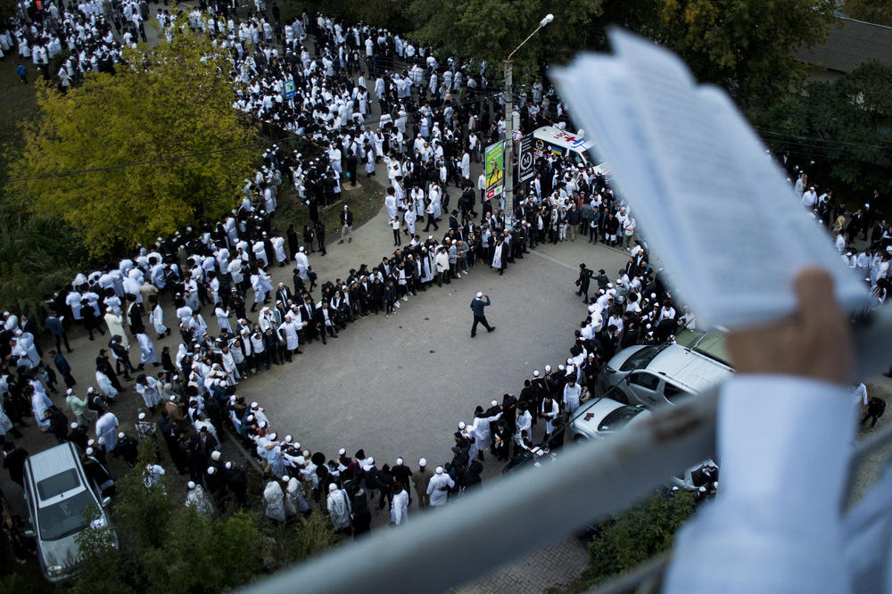 Hasidic pilgrims dance and sing in a circle during the annual Rosh Hashanah pilgrimage to Rabbi Nachman's tomb in Uman on Monday.