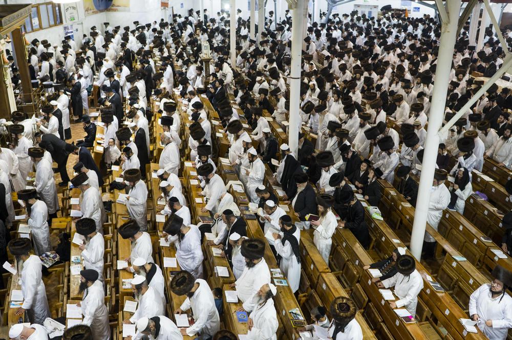 Worshipers pray in a synagogue in Uman on Tuesday.