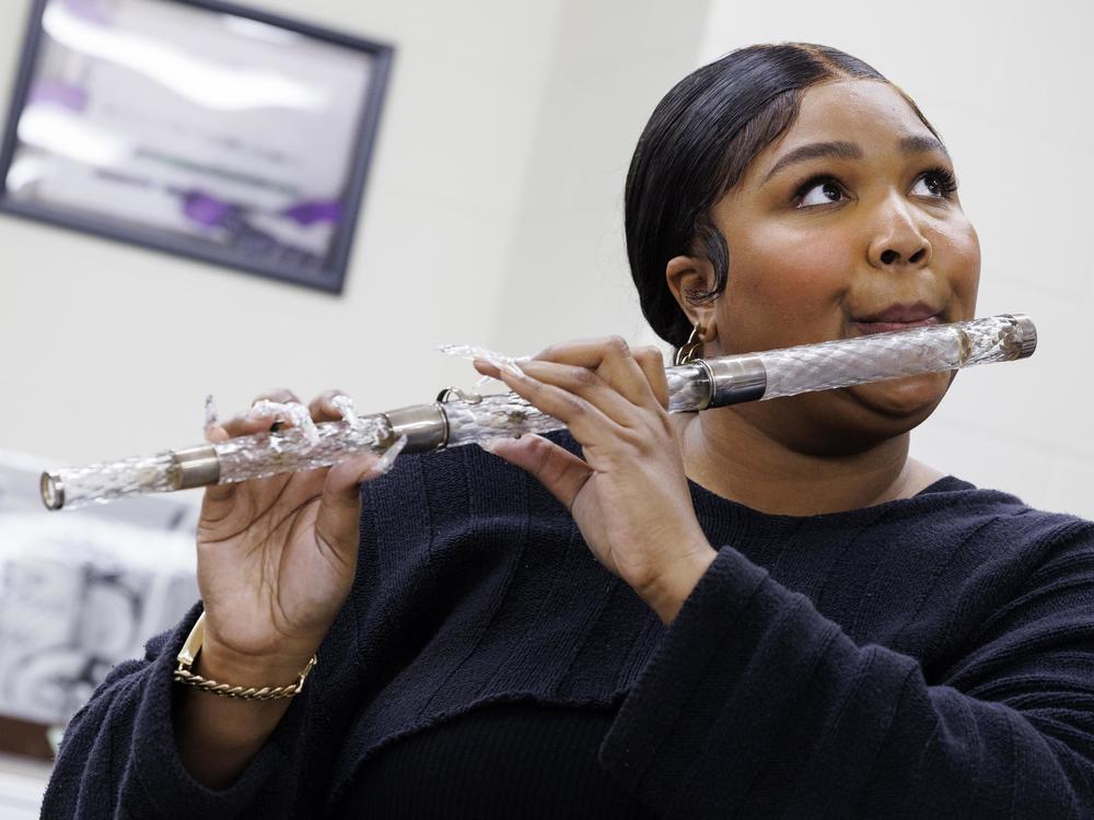Lizzo plays President James Madison's crystal flute in the flute vault at the Library of Congress in Washington, D.C. on Sept. 26, 2022.