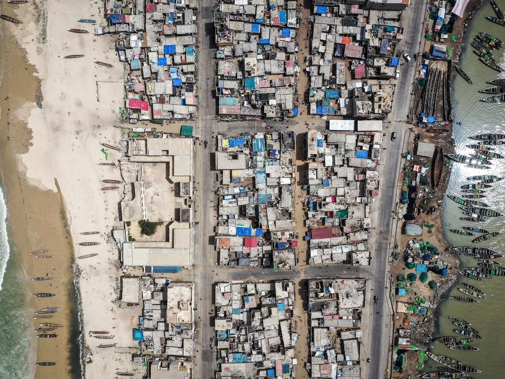 Rising seas have displaced hundreds of people from Guet NDar fishing village in Senegal to relocation camps.