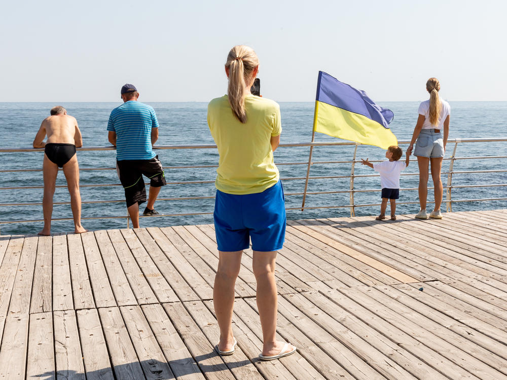 Tourists by the boulevard at a Black Sea resort in Odesa, Ukraine, on Sept. 3. Tourists are not allowed to enter the public beach due to the presence of land mines and other explosives.