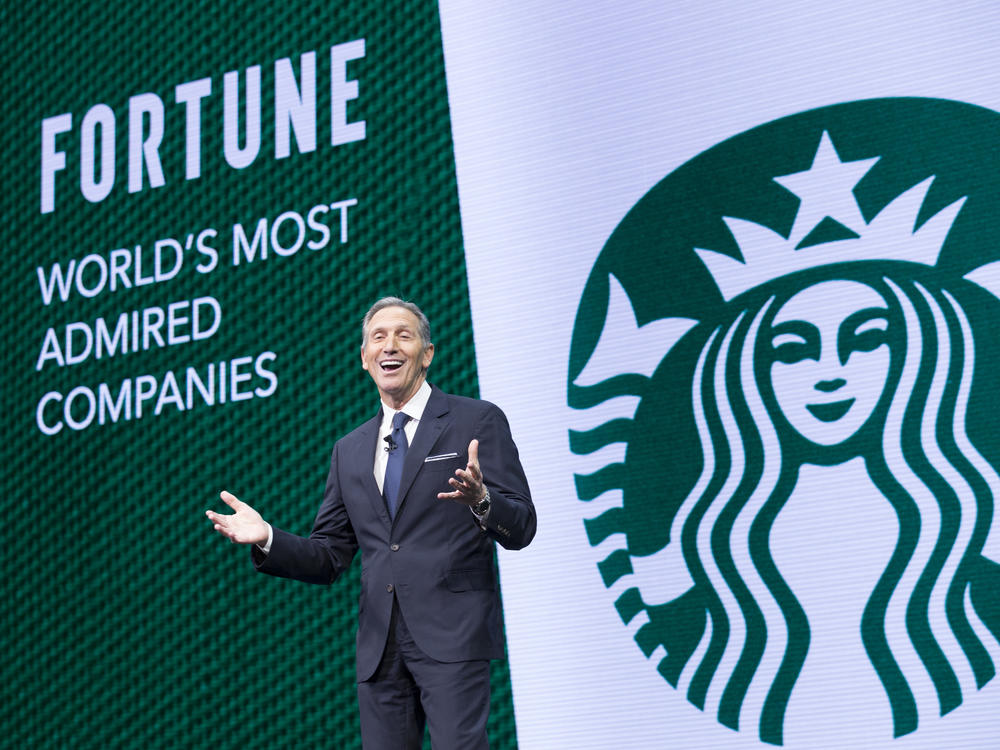 Starbucks CEO Howard Schultz speaks during the Starbucks annual meeting of shareholders in Seattle in 2017 amid happier times.