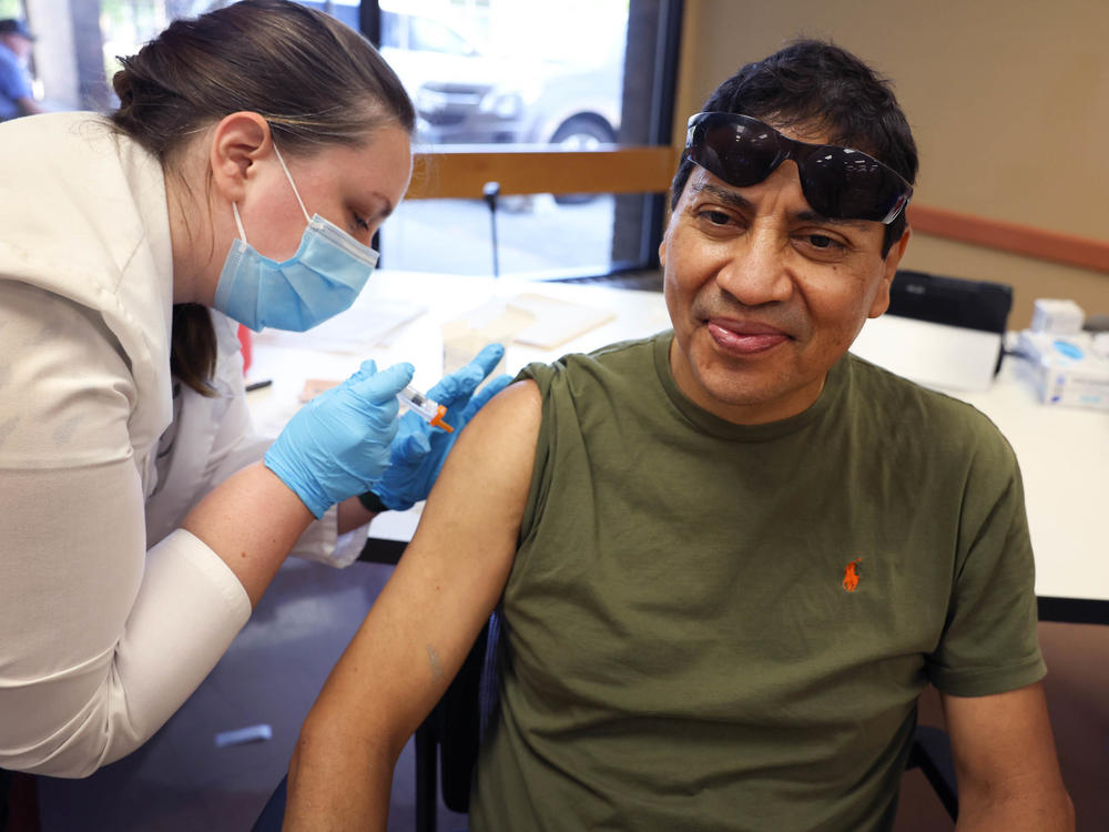 Gustavo Perez got his influenza vaccine from pharmacist Patricia Pernal in early September during an event hosted by the Chicago Department of Public Health at the city's Southwest Senior Center. This year's flu season may strike earlier and harder than usual, experts warn. A flu shot's your best protection.