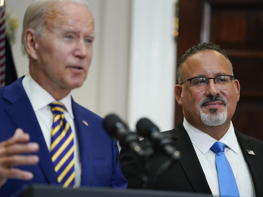U.S. Education Secretary Miguel Cardona appeared alongside President Biden when he announced his student loan relief plan on Aug. 24. On Thursday, the administration quietly changed its guidance around which borrowers qualify for this relief.