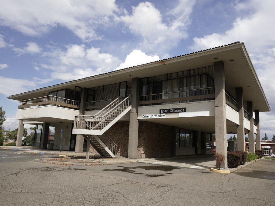 A commercial building sits empty Sept. 19 in Citrus Heights, Calif., northeast of Sacramento. Two new laws in California will let developers bypass local governments to build housing on commercial land.