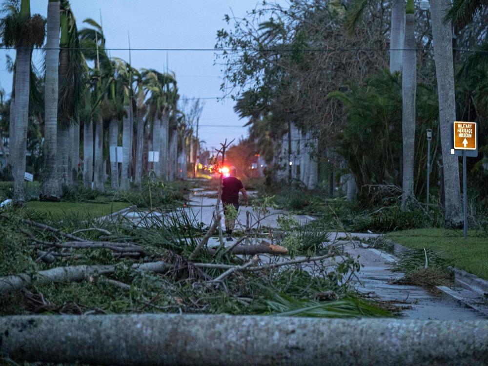 Hurricane Ian left debris in Punta Gorda, Fla., after it made landfall. Storms like Ian are more likely because of climate change.