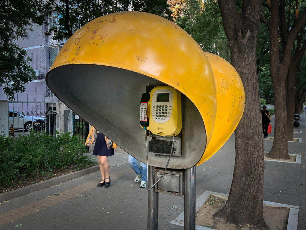 In July, this Beijing payphone began ringing. Who was calling?