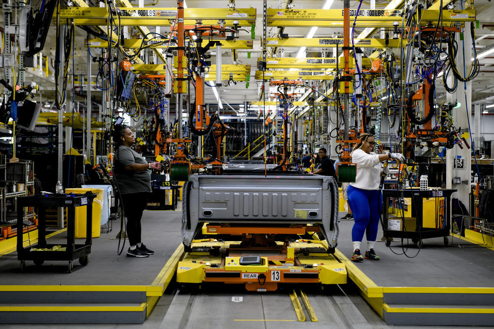 Employee work on a truck bed for the Ford F-150 Lightning at the Ford Rouge Electric Vehicle Center in Dearborn, Mich., on September 7th, 2022.