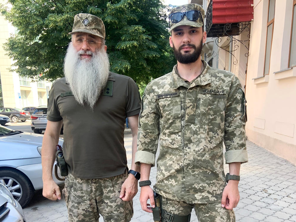 Asher and David Cherkaskyi, Ukrainian Orthodox Jews who are father and son and have both been on the front lines in Ukraine's fight against Russian occupation, in Dnipro in July.