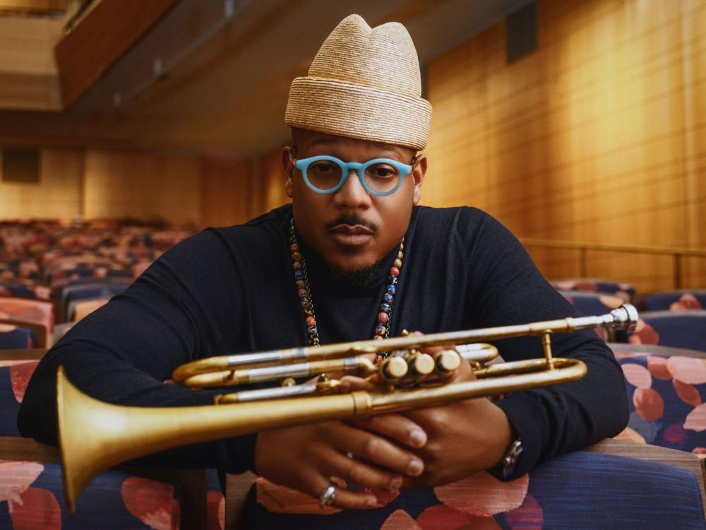 Composer and trumpeter Etienne Charles, in a portrait taken inside the newly renovated David Geffen Hall at Lincoln Center.