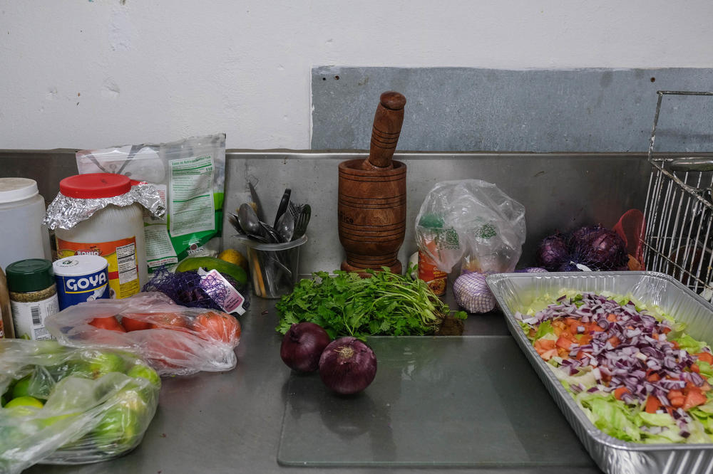A cooking and food station at Tropishack in Guayama, Puerto Rico.