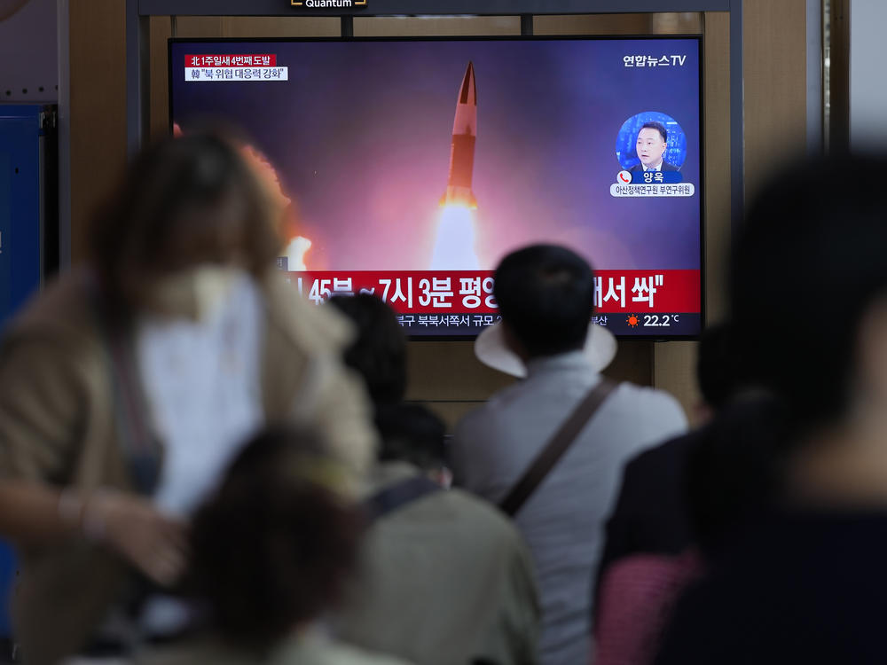 A TV screen showing a news program reporting about North Korea's missile launch with file imagery, is seen at the Seoul Railway Station in Seoul, South Korea, on Saturday.