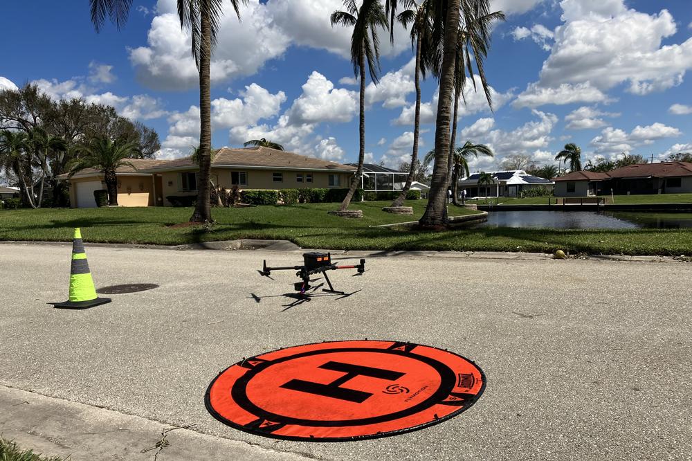 A drone being used by Alachua County Fire Rescue surveys hurricane damage in the Cypress Lake neighborhood of Fort Myers, Fla., on Saturday. David Merrick, director of the Florida State University Center for Disaster Risk Policy, coordinates the state's drone reconnaissance.
