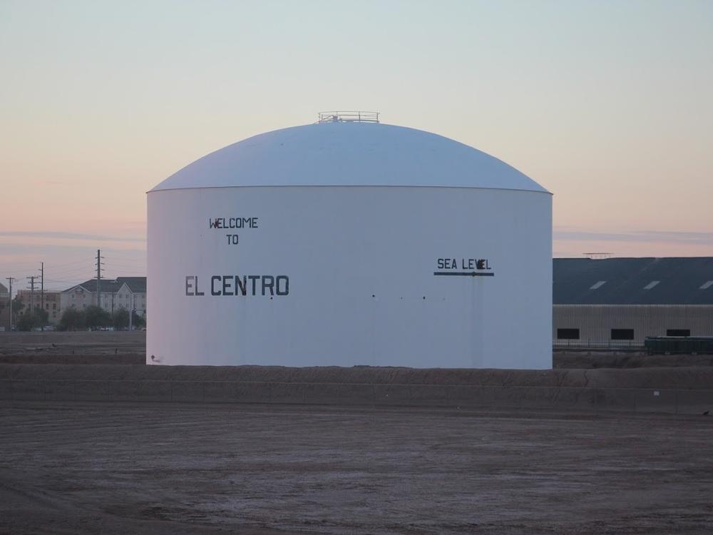 The water tower in El Centro, the county seat of Imperial County, notes a geographic fact that shapes this area's destiny. It lies below sea level, allowing water from the Colorado River to flow there by gravity alone.