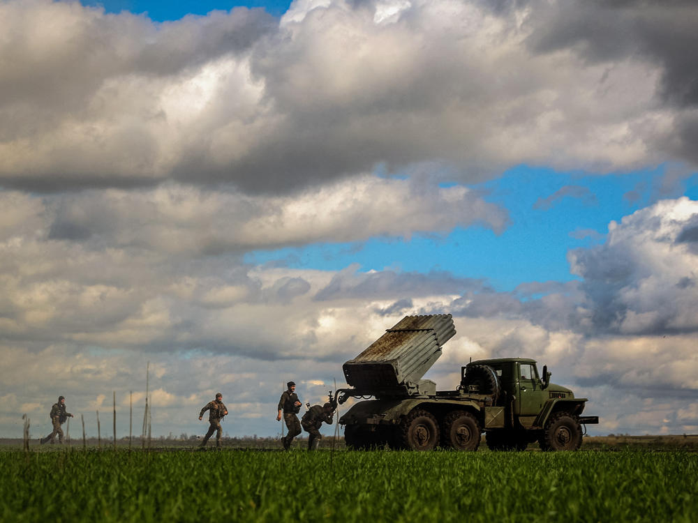 Soldiers prepare to fire BM-21 Grad rocket launcher toward Russian positions in Ukraine's eastern Donetsk region on Monday. Russia intends to annex Donetsk but Ukrainian forces retook Lyman, a strategic city in the region, on Saturday.