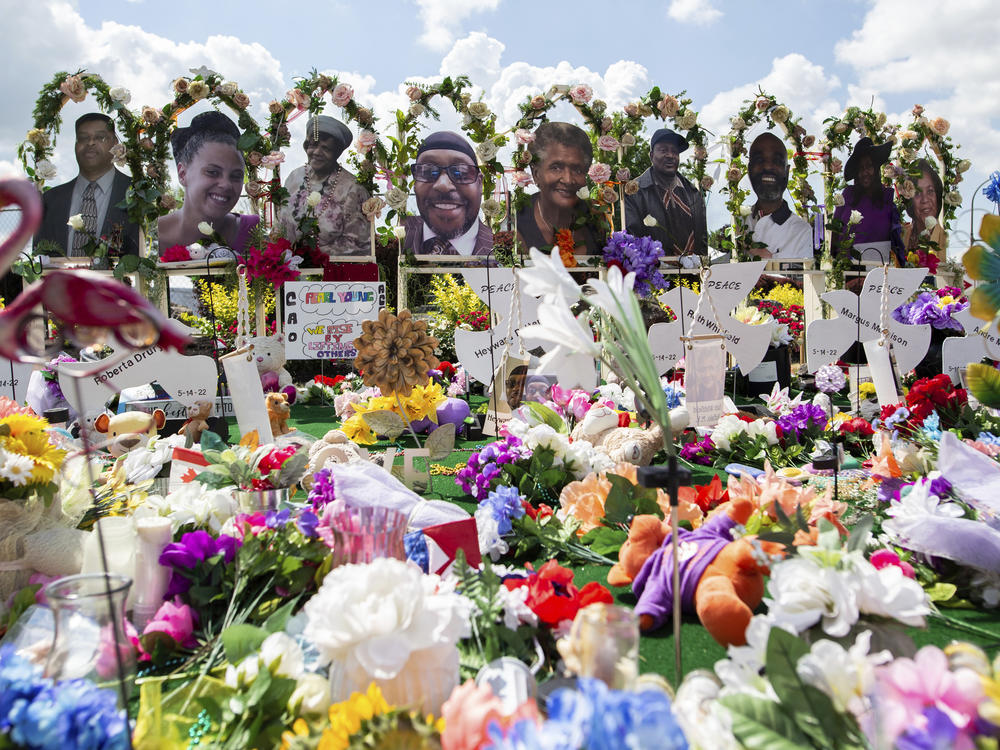 Justice Department's Civil Rights Division announced a new initiative to combat unlawful acts of hate in the Western District of New York. Here, a memorial for the supermarket shooting victims is set up outside the Tops Friendly Market on Thursday, July 14, 2022, in Buffalo, N.Y.