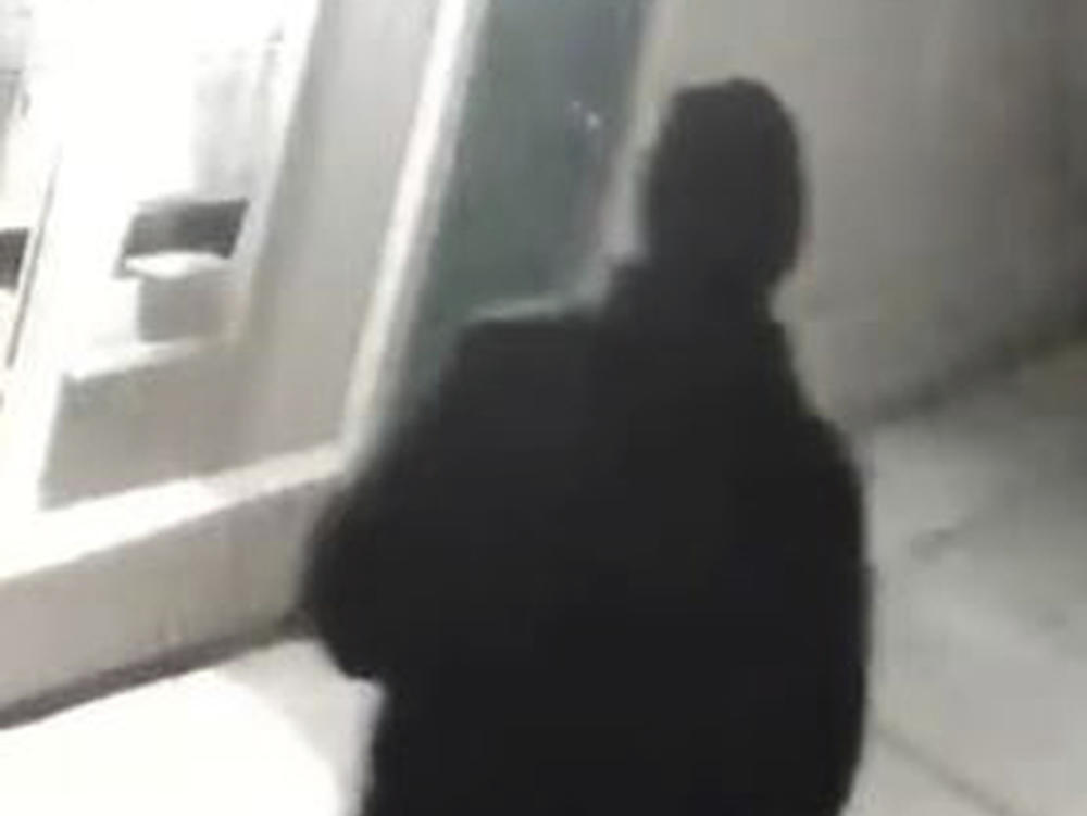 Stockton Police Department officials released this undated surveillance image of a person of interest. The figure appears to match the description of the only surviving victim of a suspected serial killer who has fatally shot six people.