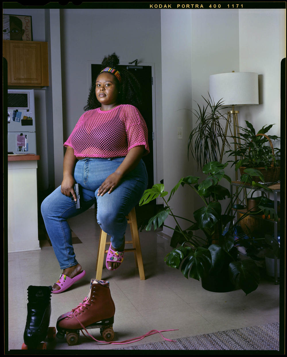 Stephanie Riley, 38, inside her home on Saturday, June 25, 2022, in Chicago. Riley is a firearm instructor with 10 years of experience. Her employer first required her to own a firearm, but she soon realized she could use it for her own self-protection.