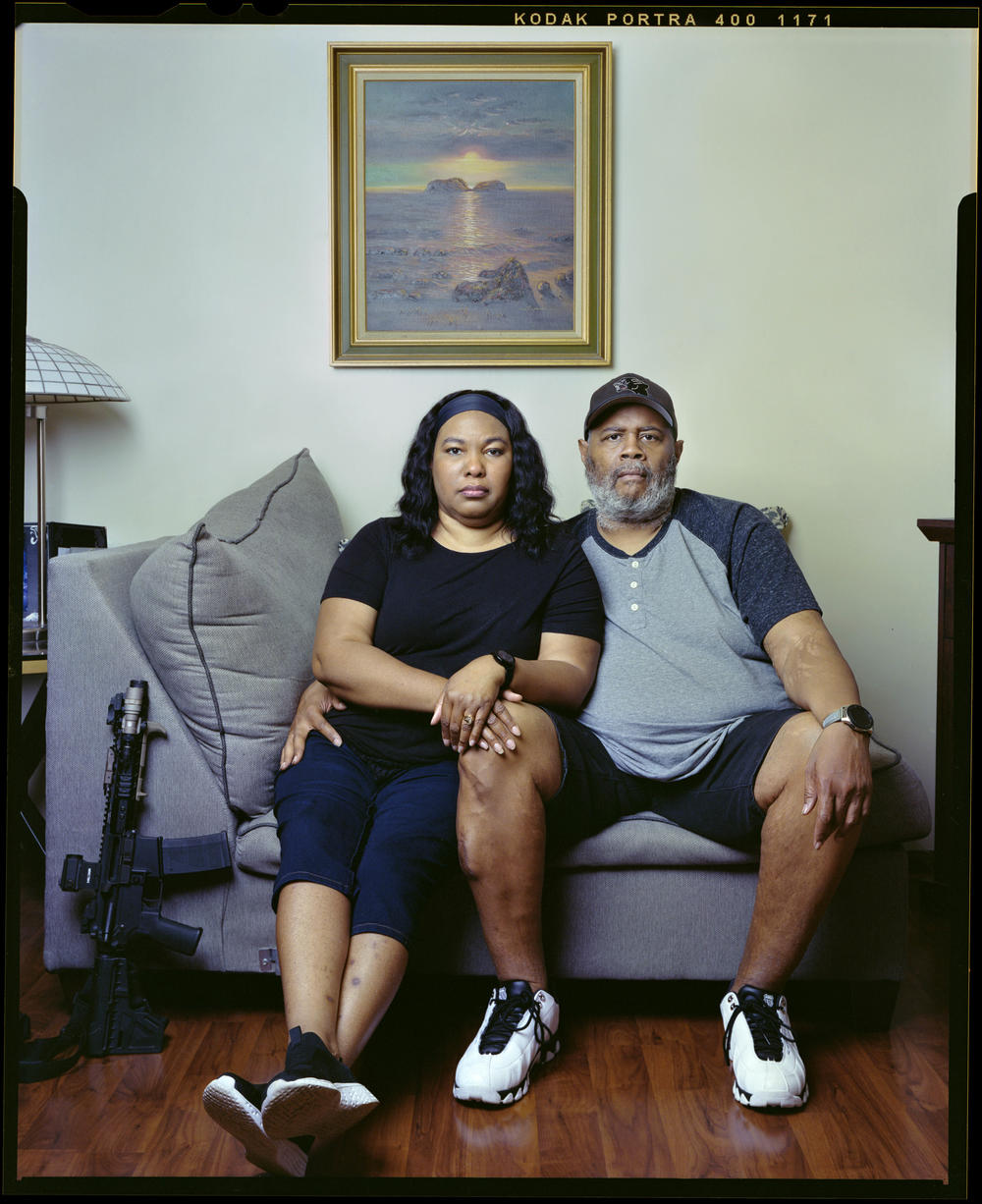 Angelique Marshall-Harris, 52, left, and her husband, Costia Harris, 56, sit on their couch on Monday, July 11, 2022, in Burnham, Ill. The dynamics of their family changed once Costia underwent dialysis treatment. Angelique realized that her husband would have difficulty defending their house in the case of an intruder. 