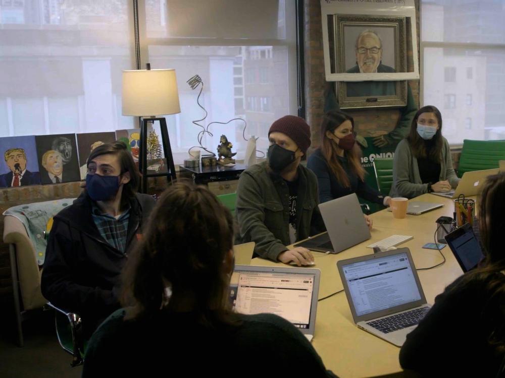 Members of The Onion's editorial team attend a team meeting in their Chicago office in 2020. Gillis says it employs about a dozen staff writers, plus contributors.