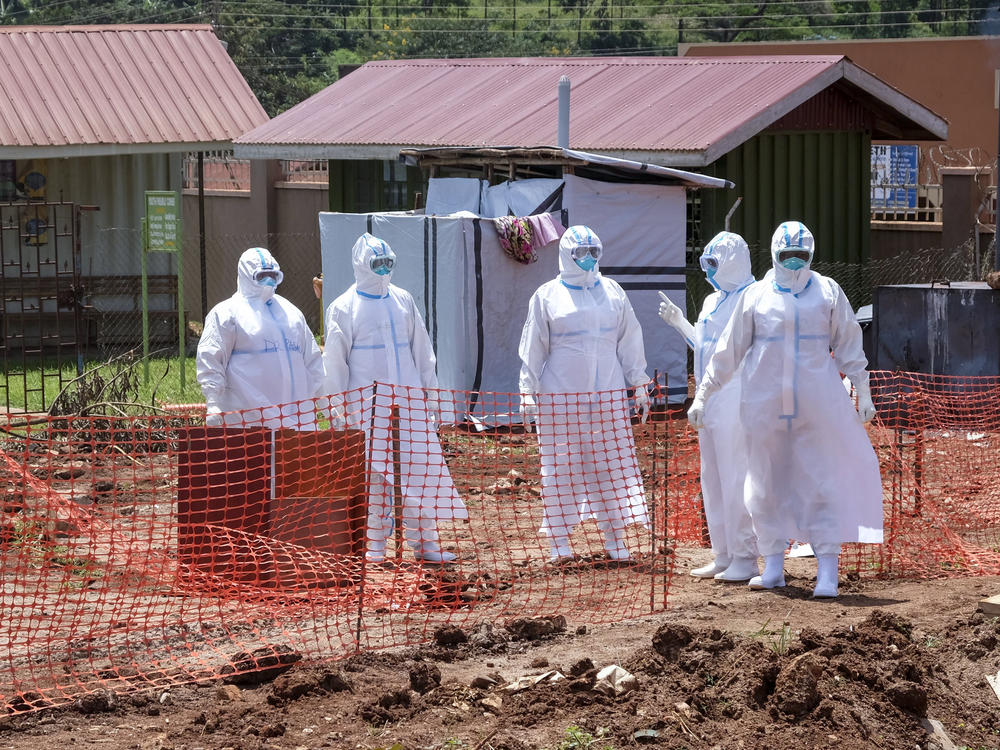 Doctors walk in the Ebola isolation section of Mubende Regional Referral Hospital, in Mubende, Uganda, on Sept. 29. Ugandan health officials have declared an Ebola outbreak in several regions of the country.