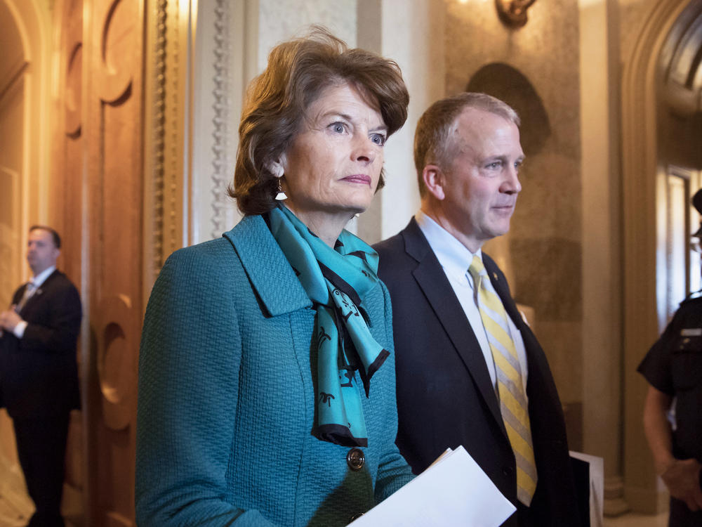 Sen. Lisa Murkowski, R-Alaska, left, and Sen. Dan Sullivan, R-Alaska, leave the chamber after a vote on Capitol Hill in Washington on May 10, 2017. Two Russians who said they fled the country to avoid compulsory military service have requested asylum in the U.S. after landing on a remote Alaskan island in the Bering Sea, Alaska U.S. Sen. Lisa Murkowski's office said Thursday, Oct. 6, 2022.