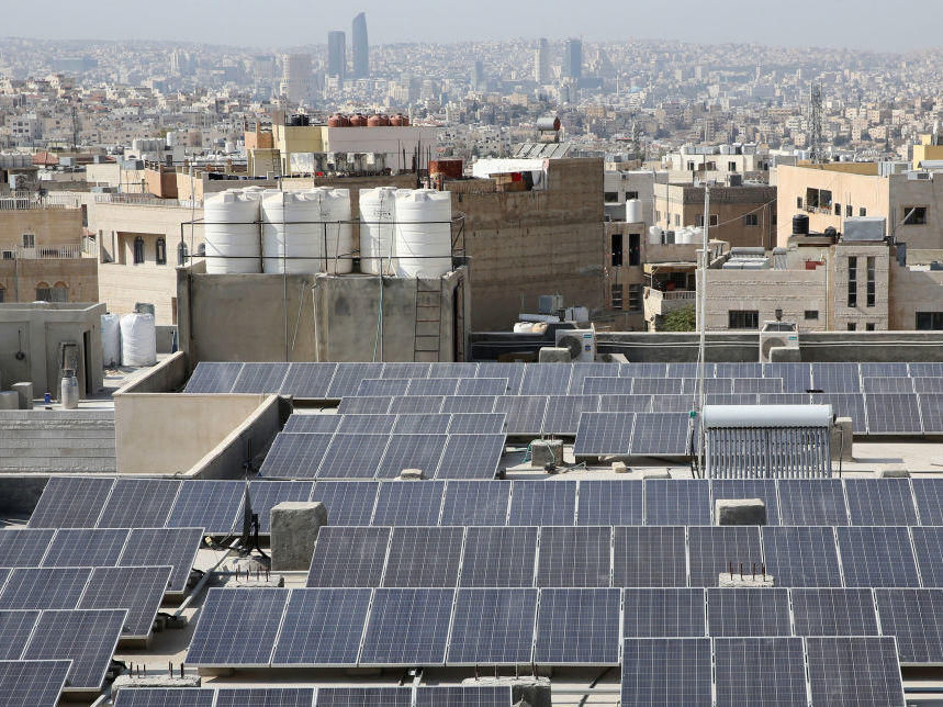 U.S. Treasury Secretary Janet Yellen says international development banks need new strategies to help countries finance the transition to low-carbon sources of energy like this rooftop solar project in Jordan.