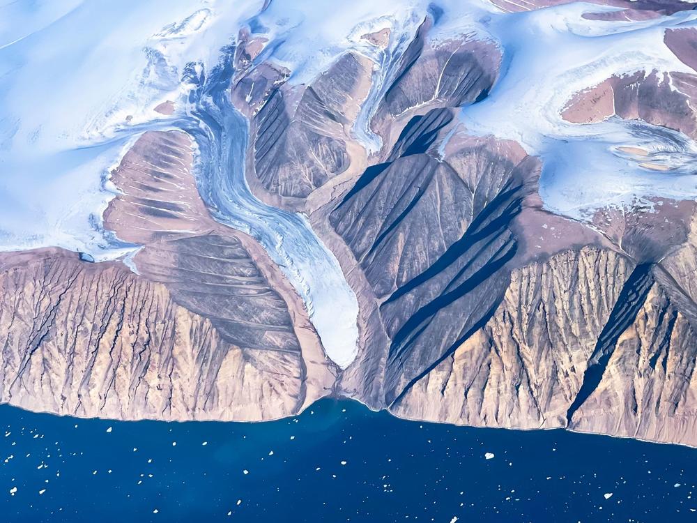 An aerial view of icebergs and the ice sheet near Pituffik, Greenland.