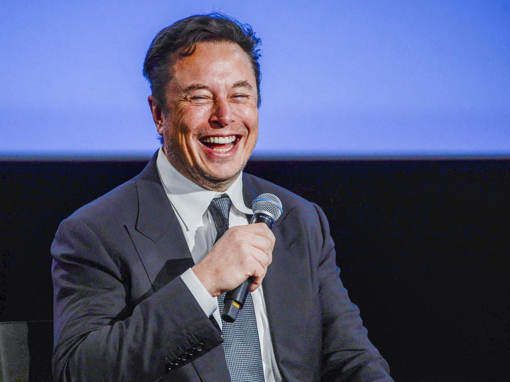 Elon Musk has until Oct. 28 to close the deal to purchase Twitter, a judge ruled on Thursday. Here, the Tesla CEO smiles while on stage at an event in Norway in August.