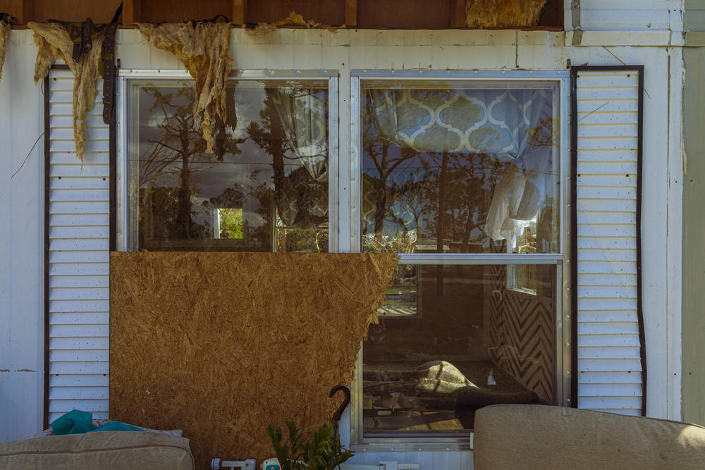 Brianna Eisemann's home in Englewood, Fla. is damaged inside and out after Hurricane Ian.