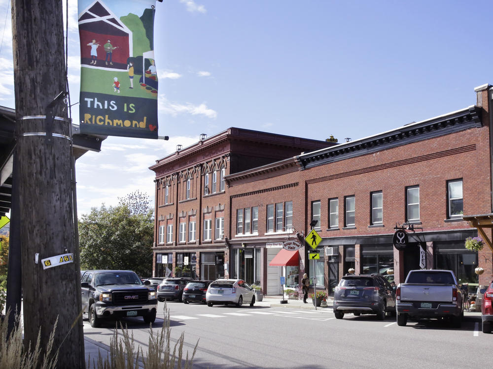 A pickup rolls through downtown Richmond, Vt., on  Wednesday. A town employee is under fire for lowering fluoride in the drinking water below the state's recommended level.