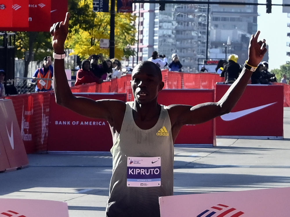 Benson Kipruto, of Kenya, reacts as he wins the Chicago Marathon on Sunday.