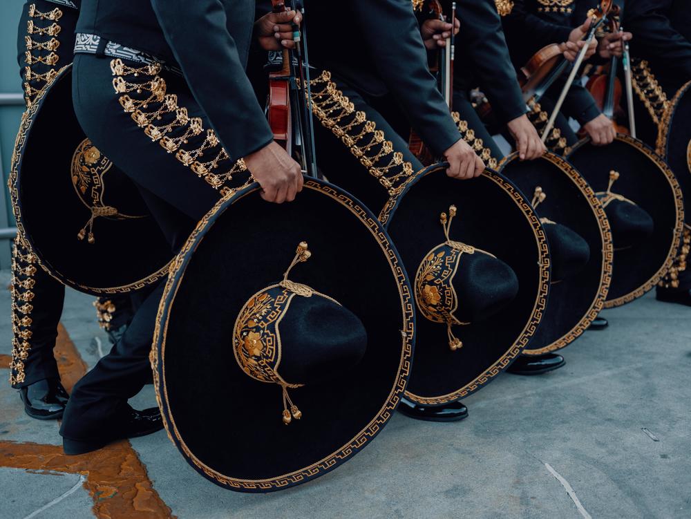Members of Mariachi Estrella de México, from Guadalajara, Jalisco, Mexico, gather to take a photo at the MARIACHI USA festival in June.