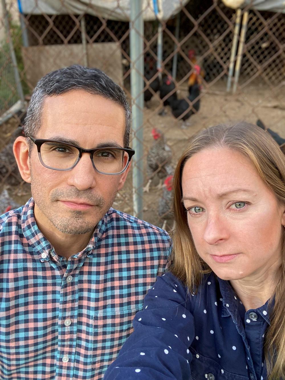 Andrea and Mike Johansen with some of the chickens at her parents' farm.