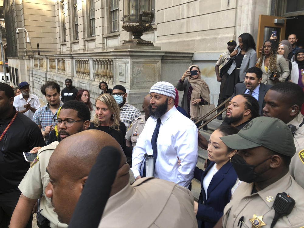 Adnan Syed (center), leaving court on Sept. 19. He was released after a judge overturned his conviction in the 1999 murder of Hae Min Lee.