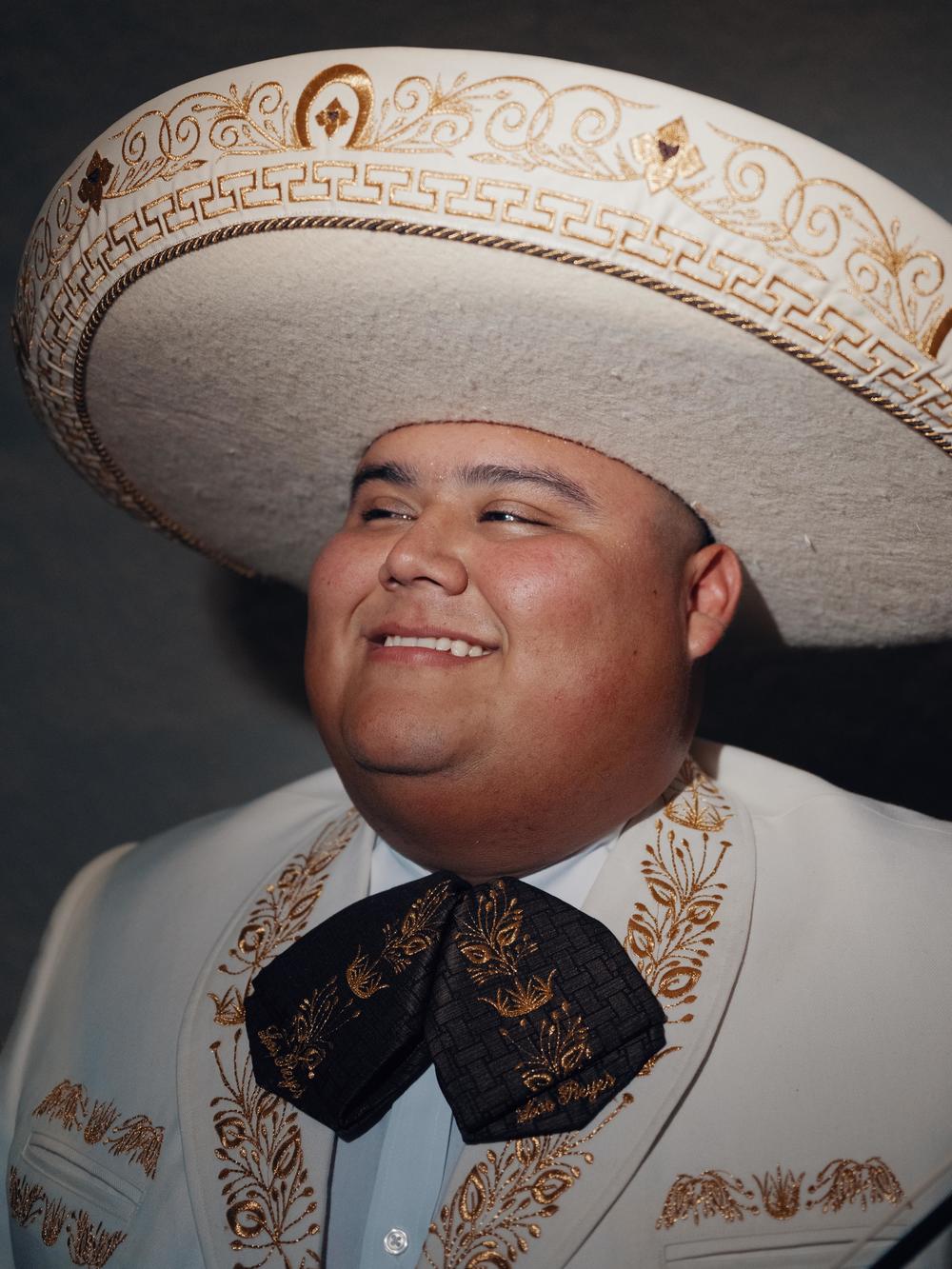 A member of Mariachi Los Reyes, poses for a photo at the MARIACHI USA festival in June.