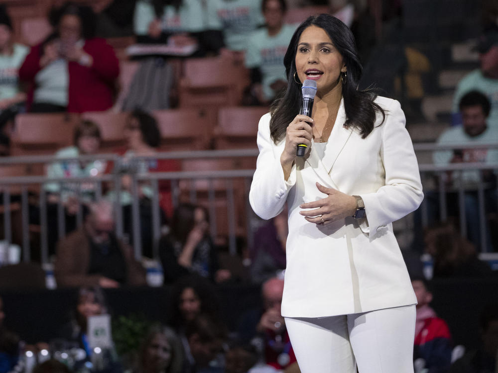In this Feb. 8, 2020, file photo, Democratic presidential candidate Rep. Tulsi Gabbard, D-Hawaii, speaks during the McIntyre-Shaheen 100 Club Dinner in Manchester, N.H.