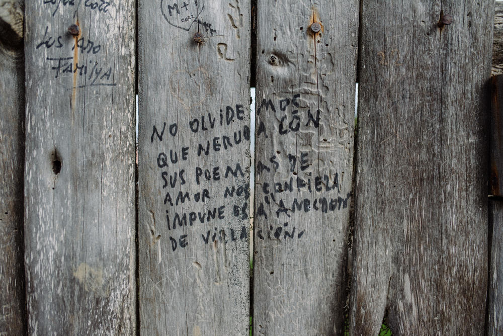 A message in graffiti reads, 
