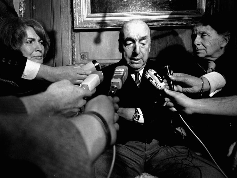 Pablo Neruda, then serving as Chile's ambassador to France, talks with reporters in Paris after being named winner of the 1971 Nobel Prize for Literature.