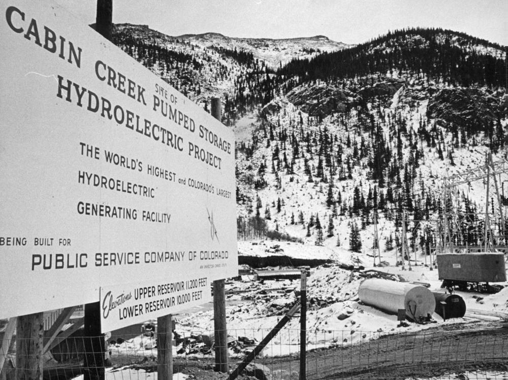Sign at the upper reservoir construction area gives details of Public Service Company's Cabin Creek Pumped Storage project, a hydroelectric power installation at an elevation above 10,000 feet near Georgetown, Colorado on April 22, 1965.
