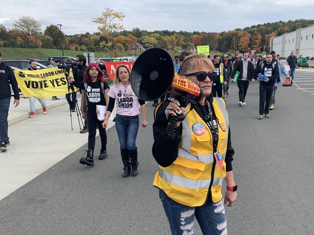 Organizer Heather Goodall, who works at Amazon's warehouse near Albany, N.Y., leads supporters of the Amazon Labor Union in a march on Oct. 10.