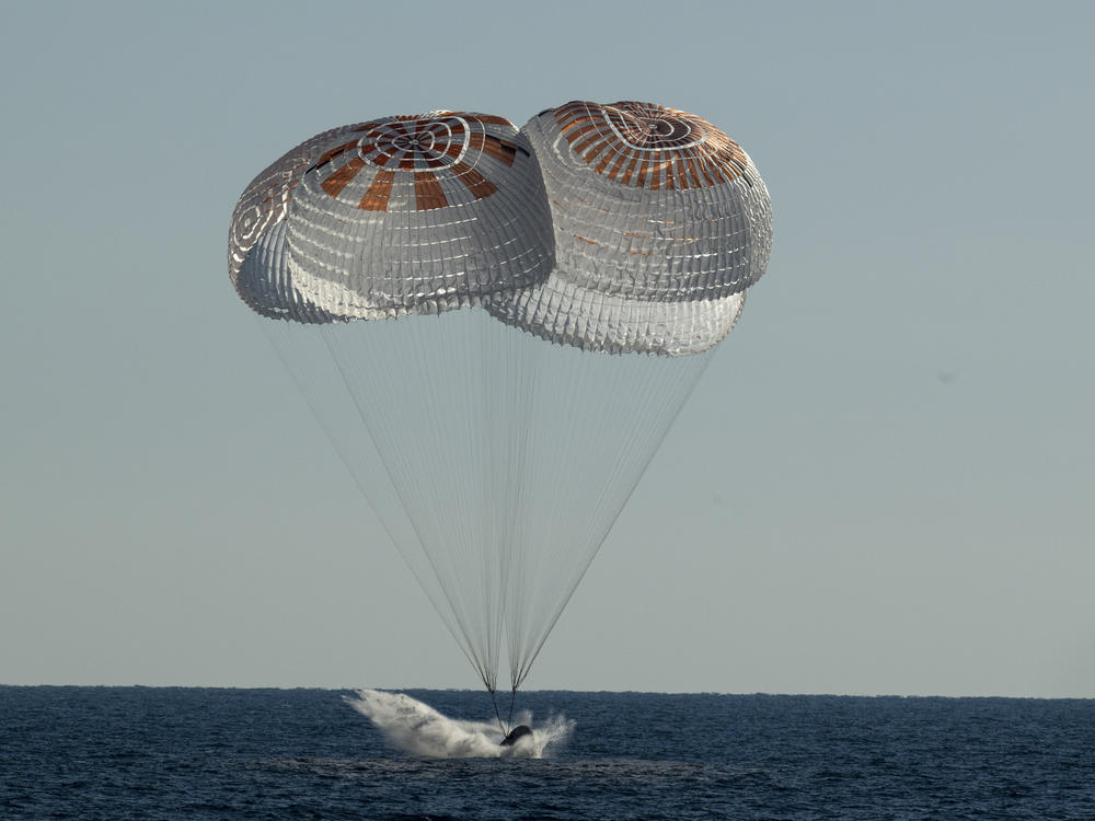 The SpaceX Crew Dragon Freedom capsule splashes down Friday in the Atlantic Ocean off Florida in a return trip from the International Space Station.