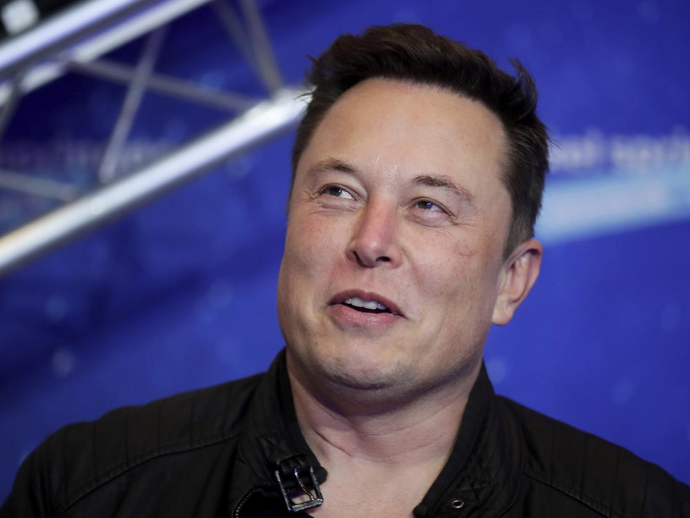 FILE - Tesla and SpaceX CEO Elon Musk arrives on the red carpet for the Axel Springer media award in Berlin on Dec. 1, 2020. Musk suggested in a Saturday, Oct. 15, 2022, tweet that his rocket company SpaceX may continue to fund its satellite-based Starlink internet service in Ukraine.
