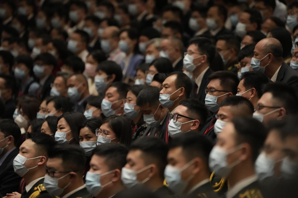 Delegates wearing masks attend the opening ceremony of the 20th National Congress of China's ruling Communist Party.