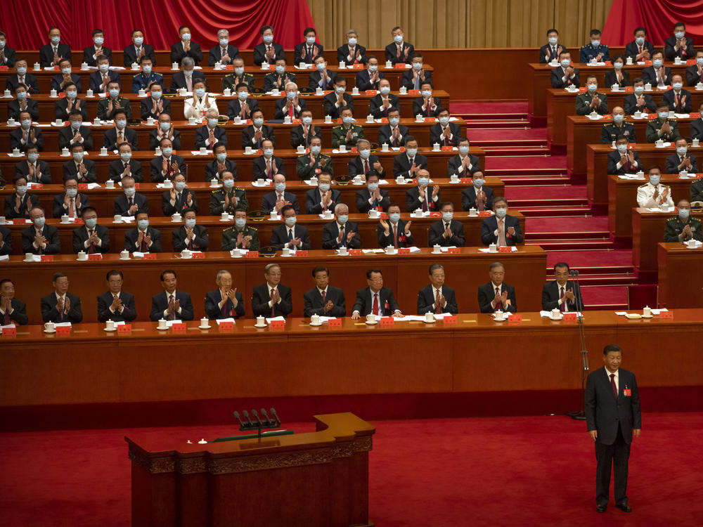 Delegates applaud after a speech by Chinese President Xi Jinping during the opening ceremony of the 20th National Congress of China's ruling Communist Party at the Great Hall of the People in Beijing, Sunday, Oct. 16, 2022.