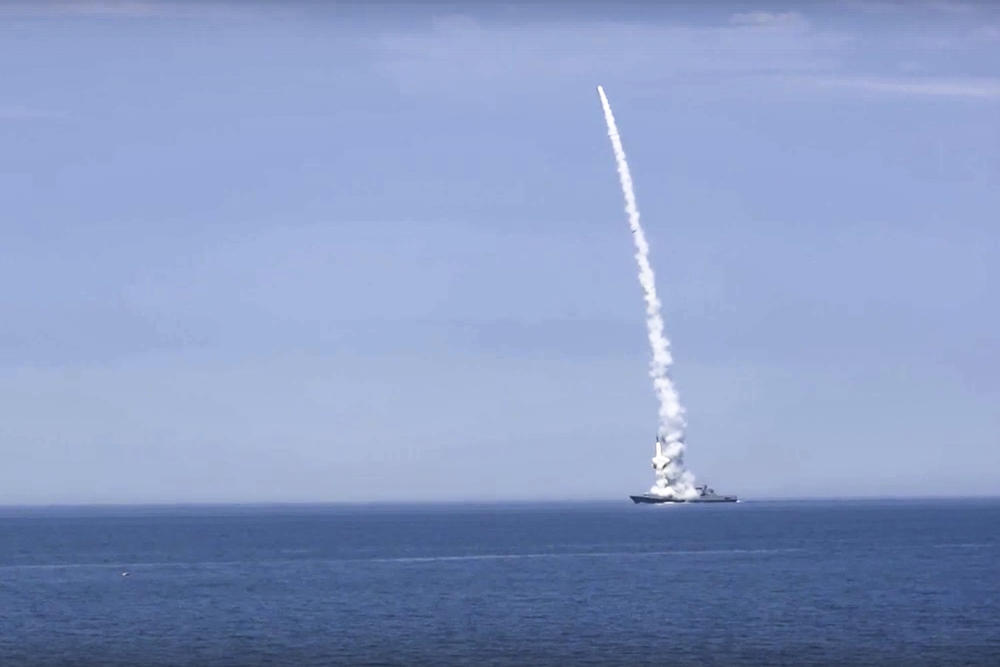 A Russian warship launches a non-nuclear cruise missile at a target in Ukraine. Experts say Russia would probably use a single tactical nuclear weapon as a signal before escalating further.